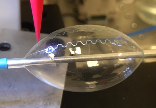 Printing conformal silver features on a bladder