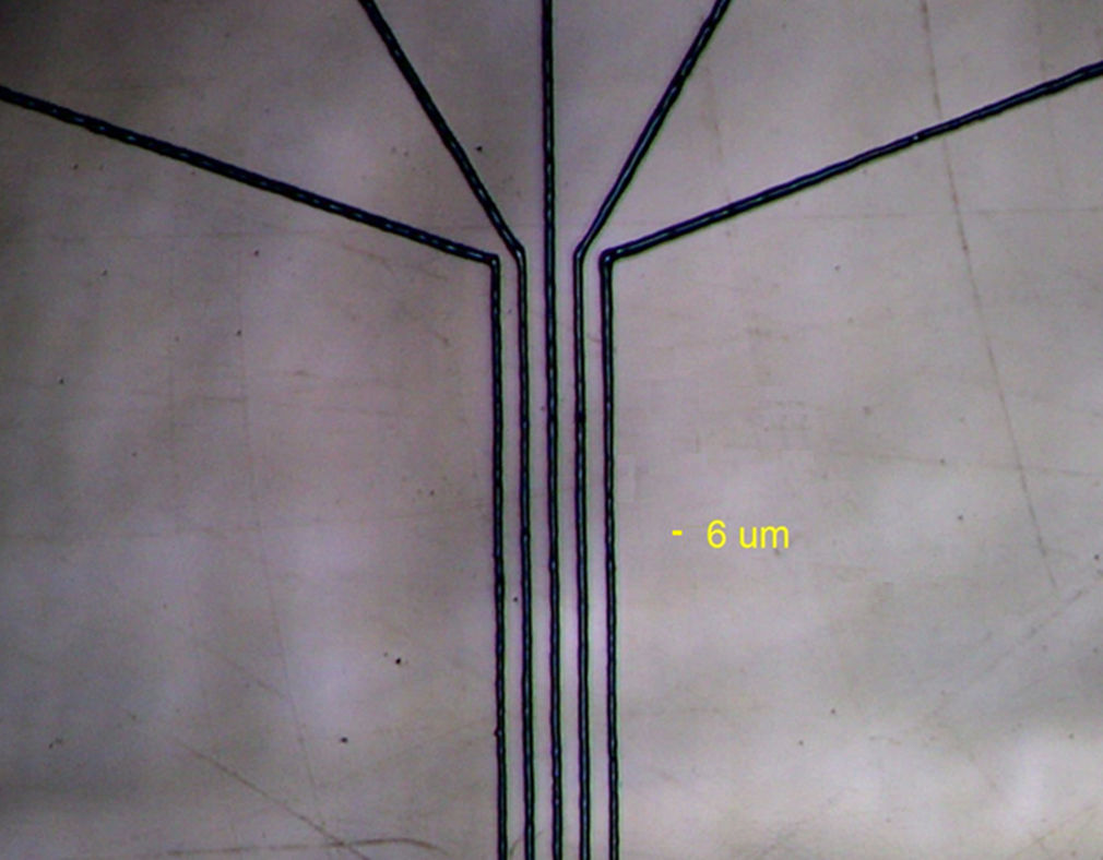 Sub 10-micron silver NanoJet aerosol printed traces