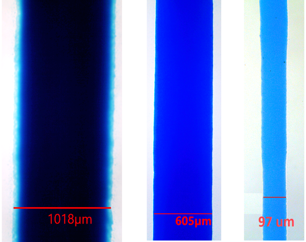 Three micrographs of high resolution IDS NanoJet printed polymer traces from 1 mm to 100 µm